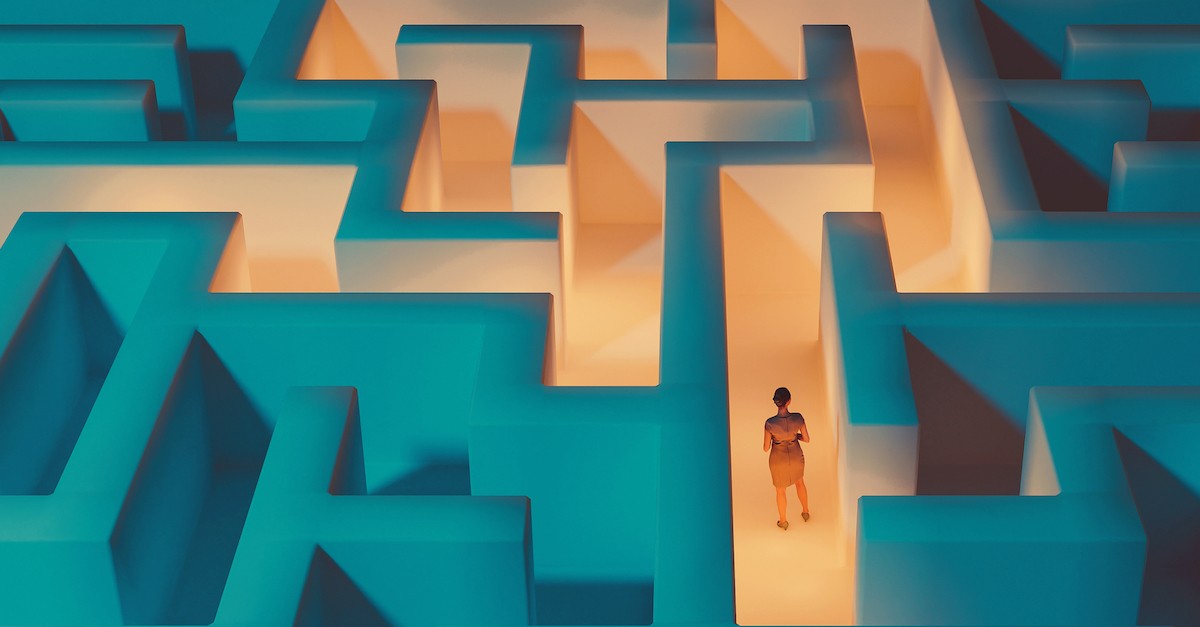 Woman choosing career path in maze job decision, prayers for job protection