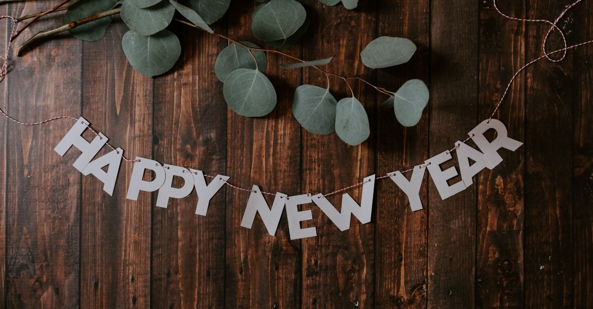 Happy New Year banner with leaves