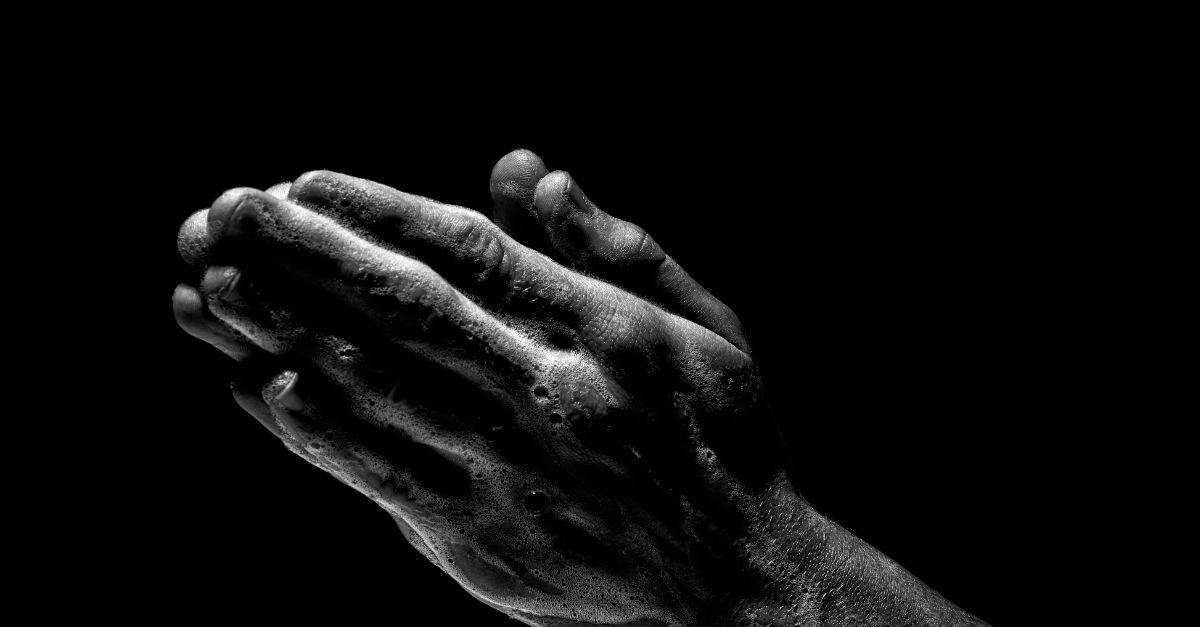Silhouette of Hands Praying