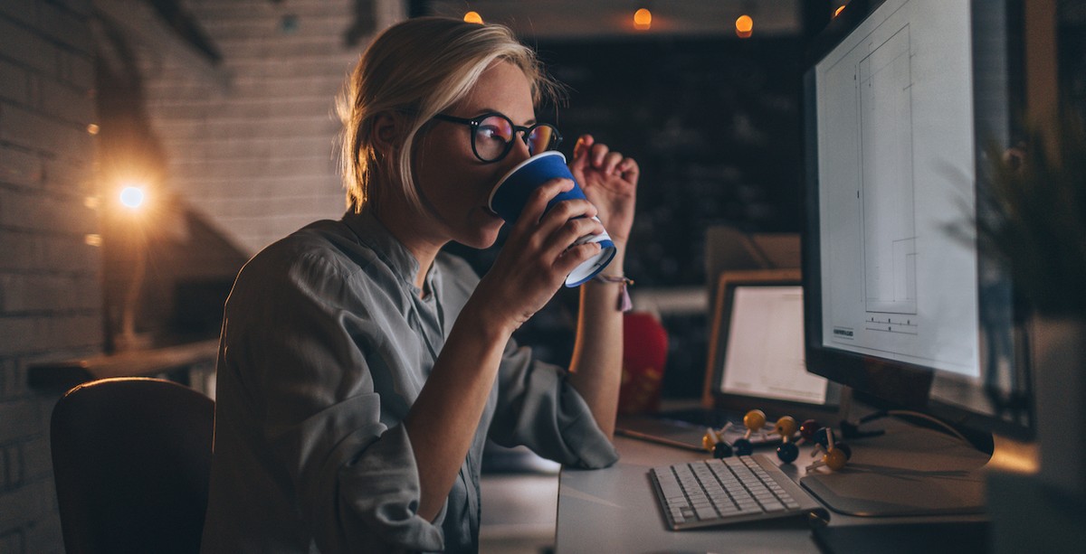 Woman working late in office at job at night drinking coffee; what is the sin of sloth?