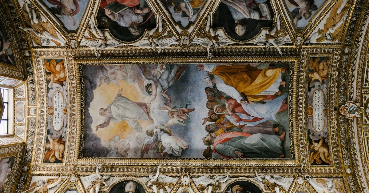 Saints painted on a cathedral ceiling; how are Catholics different from Christians?