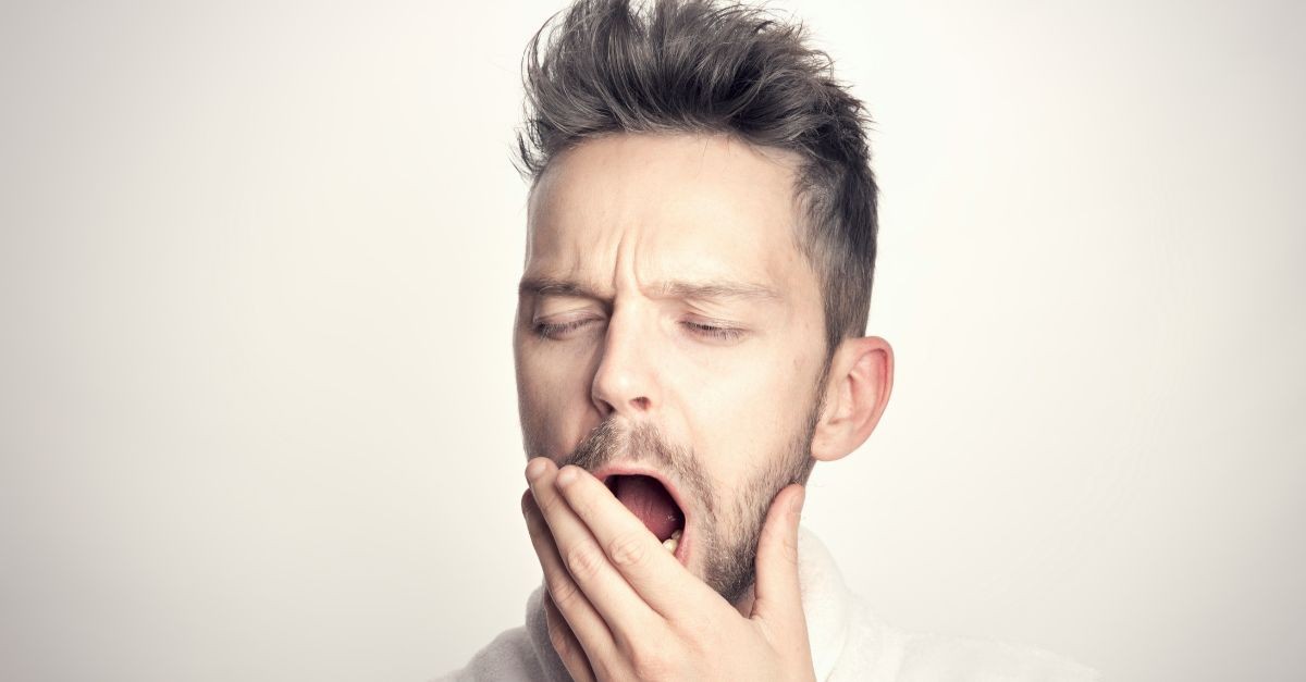 Man yawning; what to do if you are bored at church