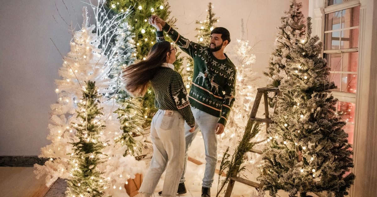 Married couple celebrating Christmas together; creating holiday traditions as a married couple.