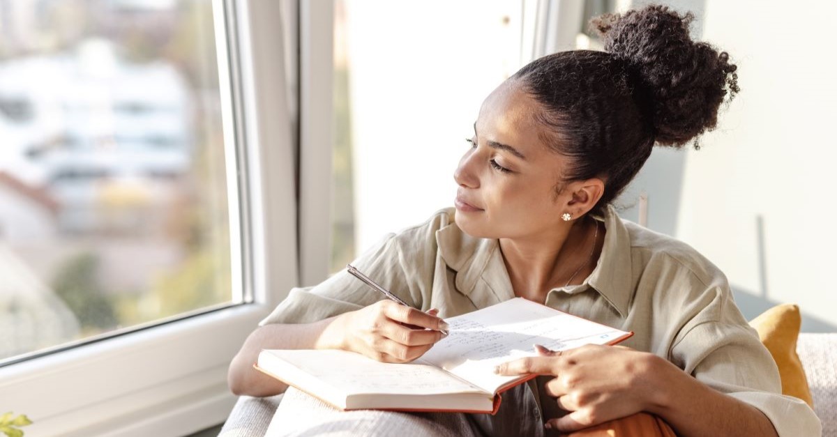 journal reflect window thinking relax woman journaling reflecting