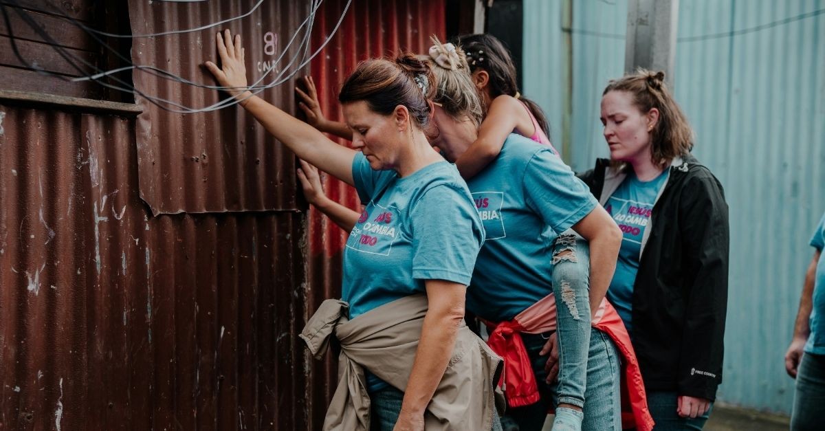 Woman Praying; Mission Trip