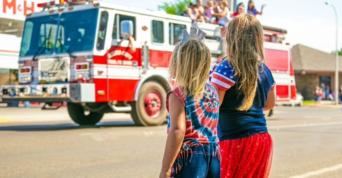 Kids Watching a Parade on the 4th of July