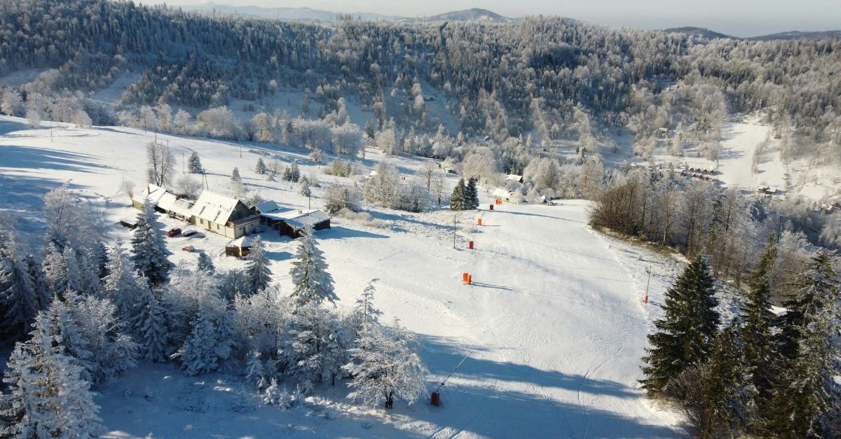 Snow Covered Mountain Prepped for a Downhill Ski Race