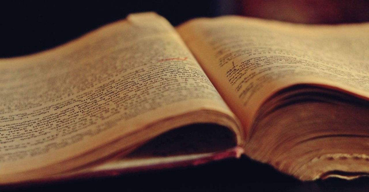 Old book or Bible open on table