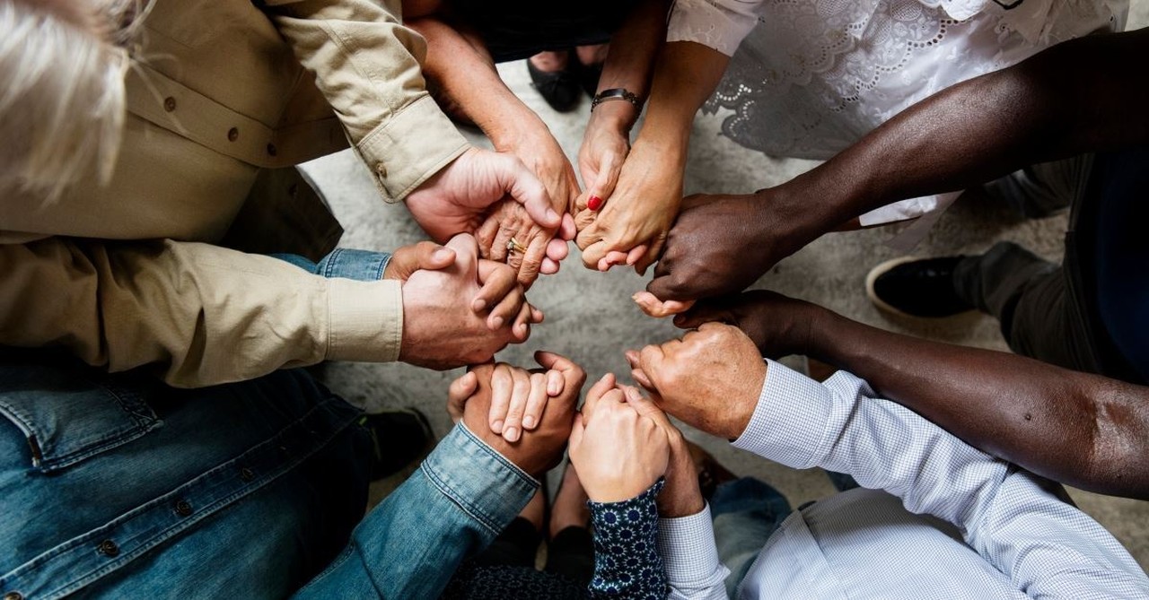 hand joined together in prayer