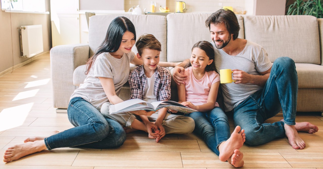 family reading together, family thankfulness book