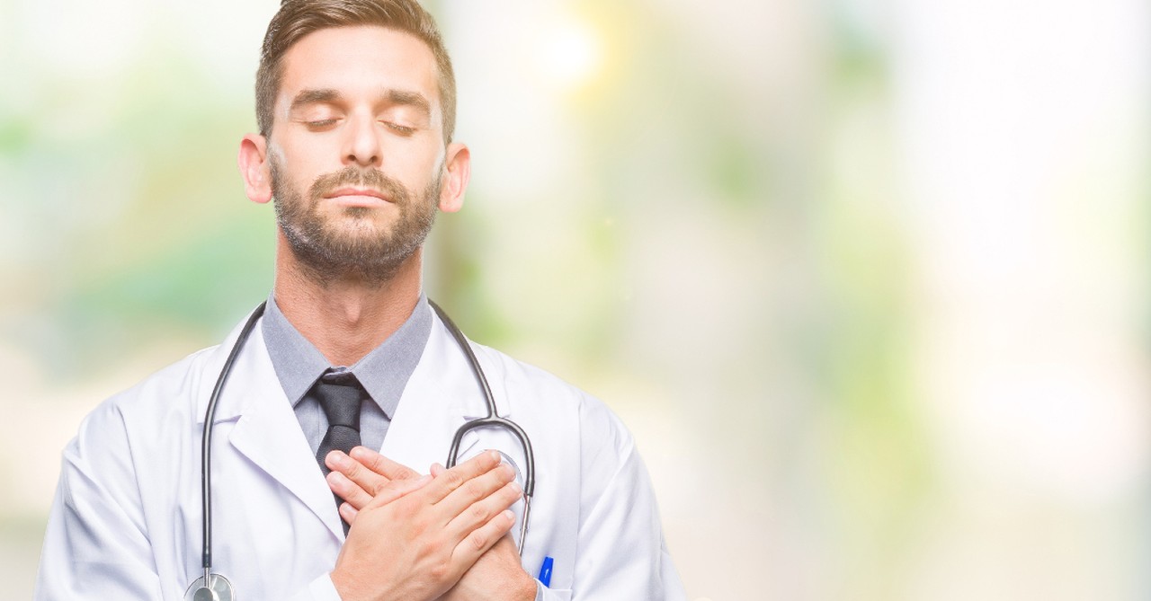 doctor praying for better days ahead