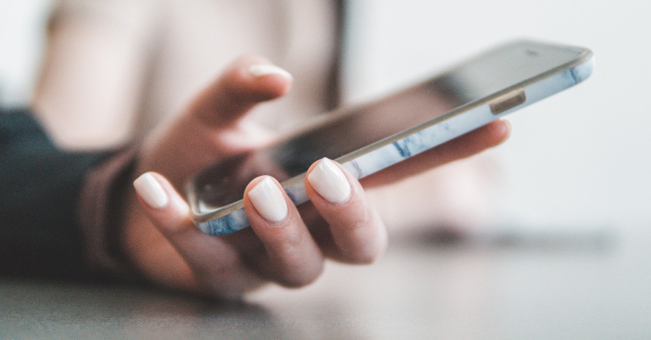 woman texting on phone