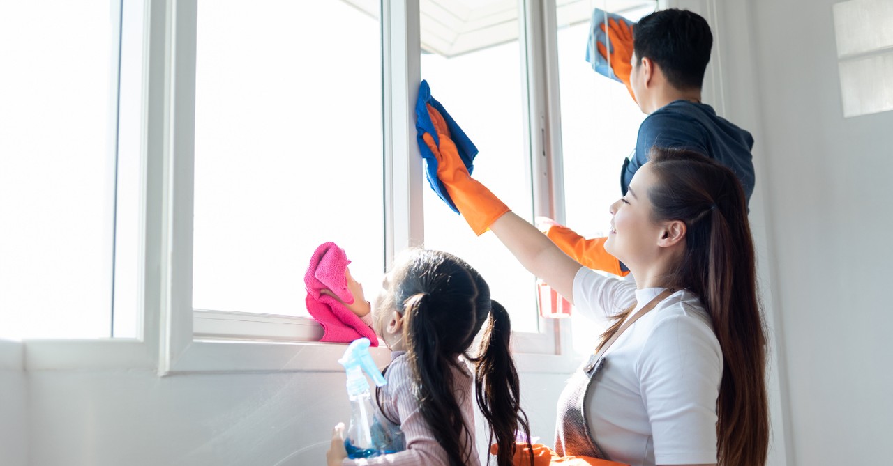 mom doing chores with kids