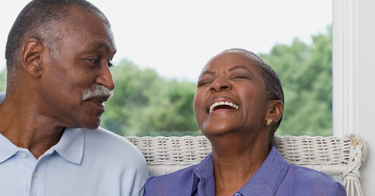 senior couple laughing together