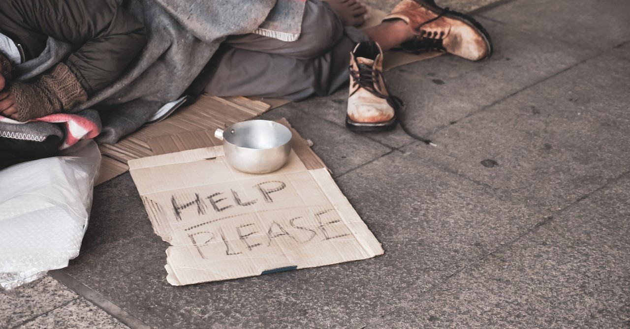 homeless man sleeping on street, who is my neighbor jesus calls out passivity