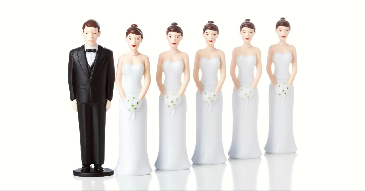 Groom and five bride cake toppers