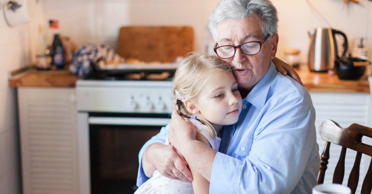 grandpa comforting their grandchild