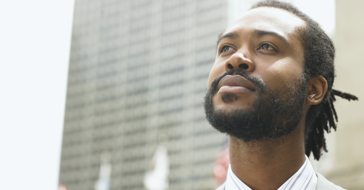 man looking up thinking outdoors