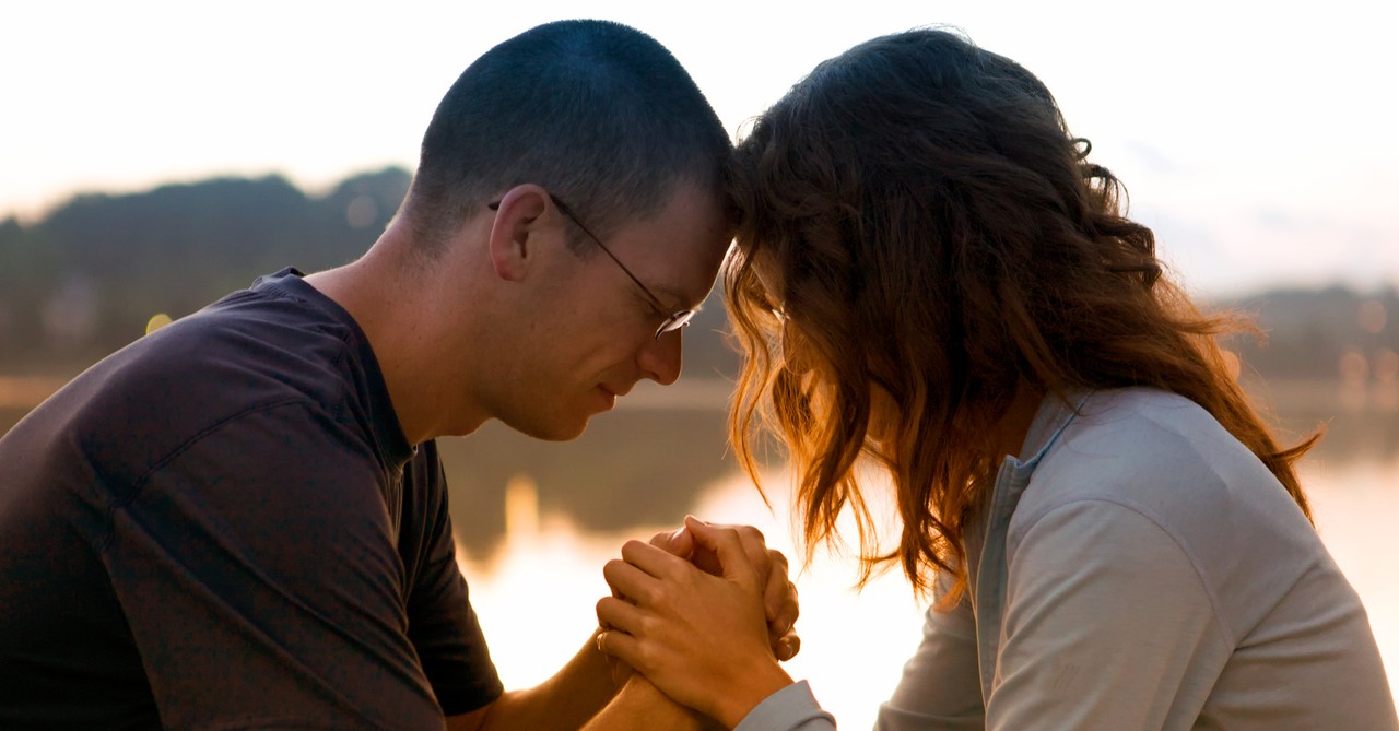 couple praying together