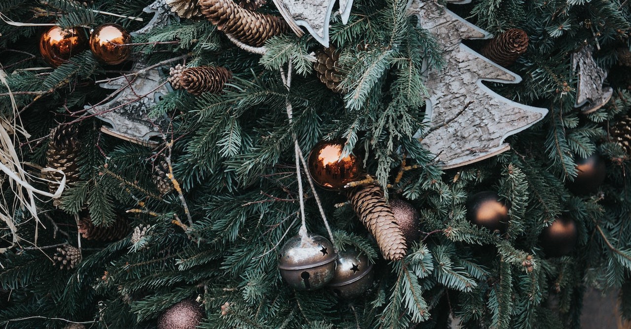 bells hanging on Christmas tree branches