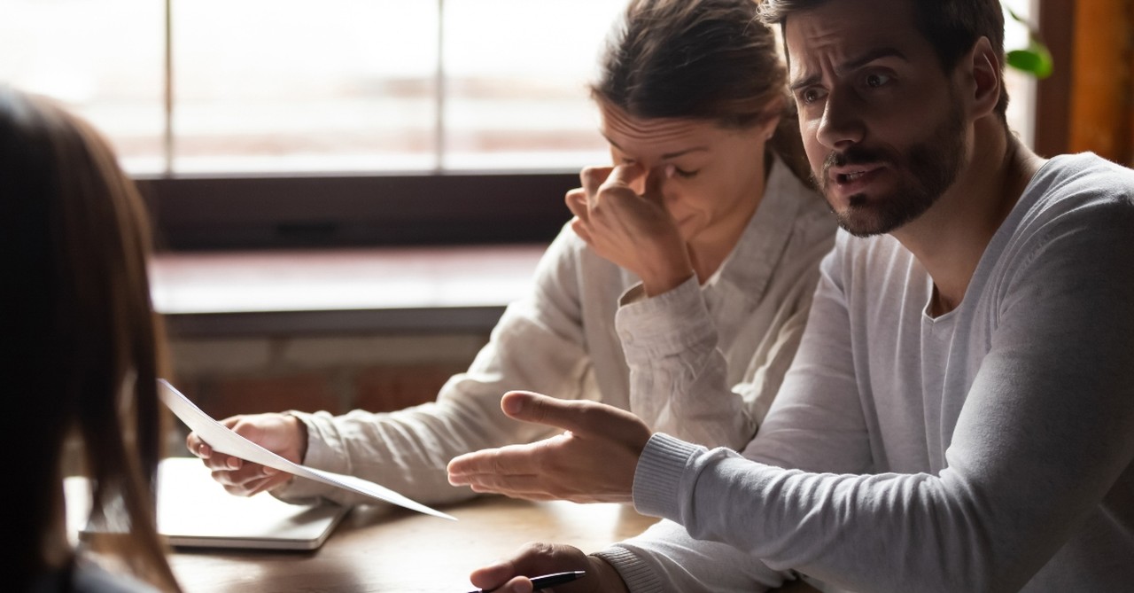 people at meeting woman looking annoyed man arguing, argue with a fool