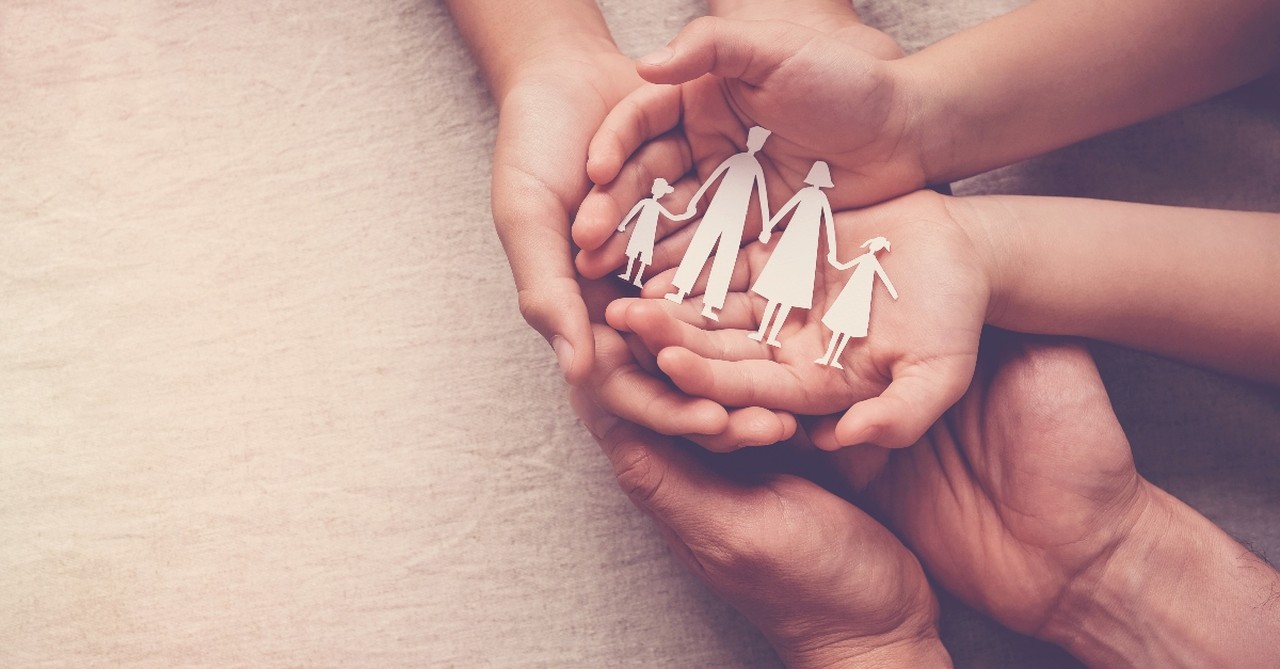 hands holding cut out of family, prayers real men pray