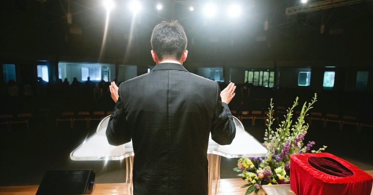 pastor in front of a pulpit, should we hold christian leaders accountable