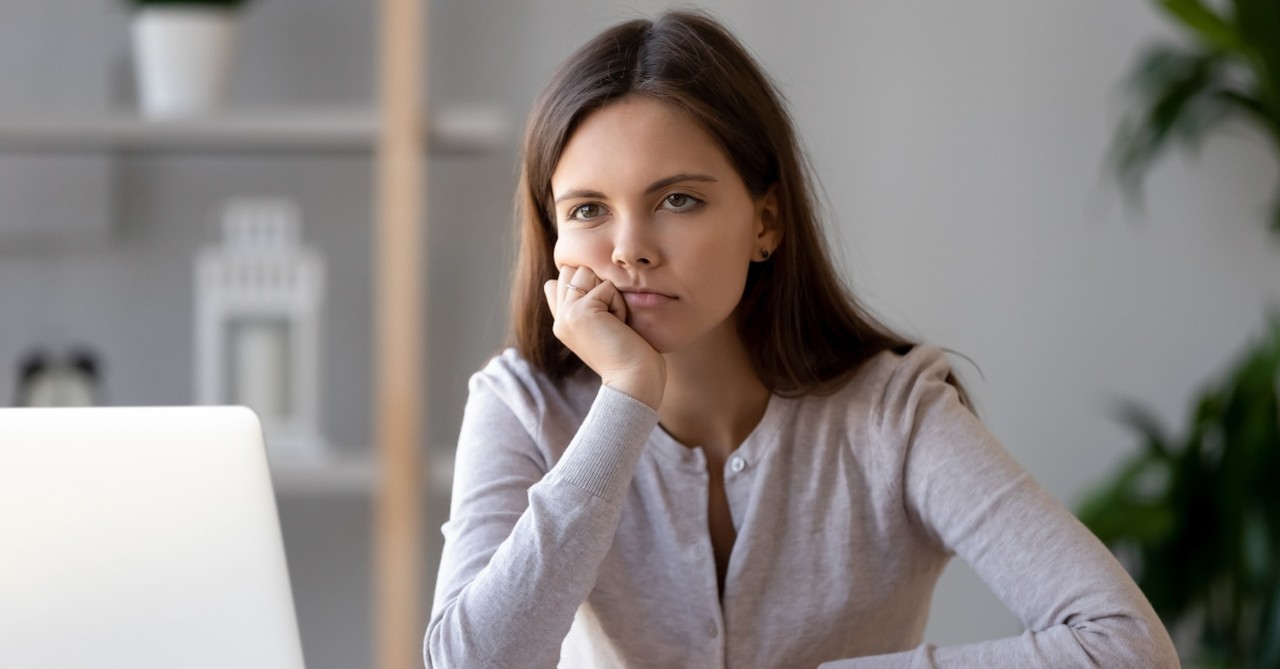 woman working looking bored and depleted, what is the sin of acedia