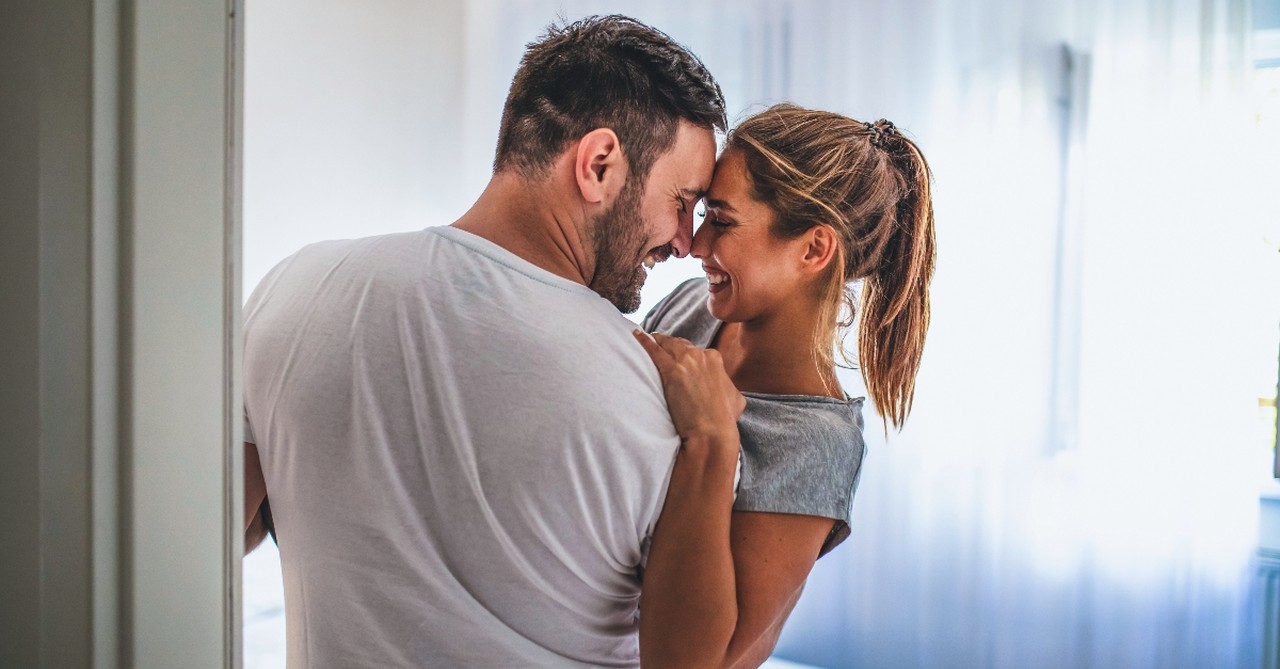 Married couple embracing lovingly, signs your marriage needs more quality time together