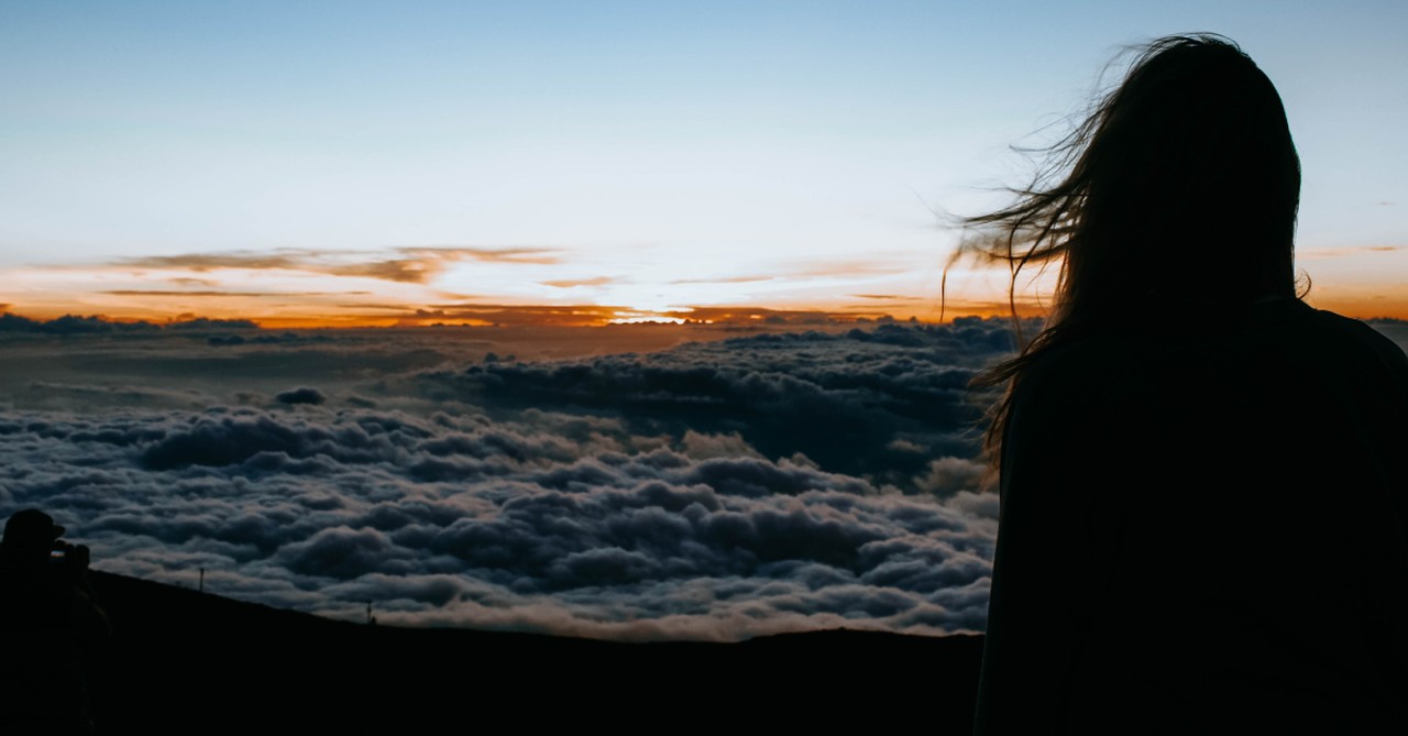 A woman pondering, losing ourselves