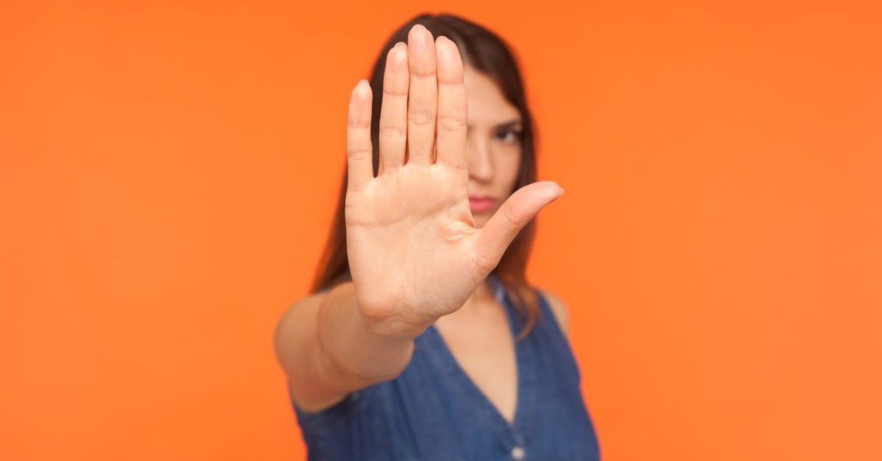 woman brunette hand up stop serious