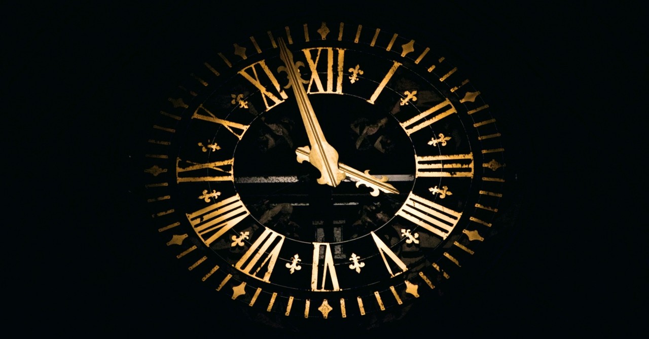 Golden face of a clock, eternal punishment in hell bible