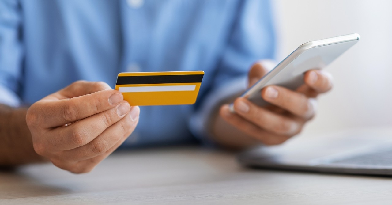 Man paying using a credit card