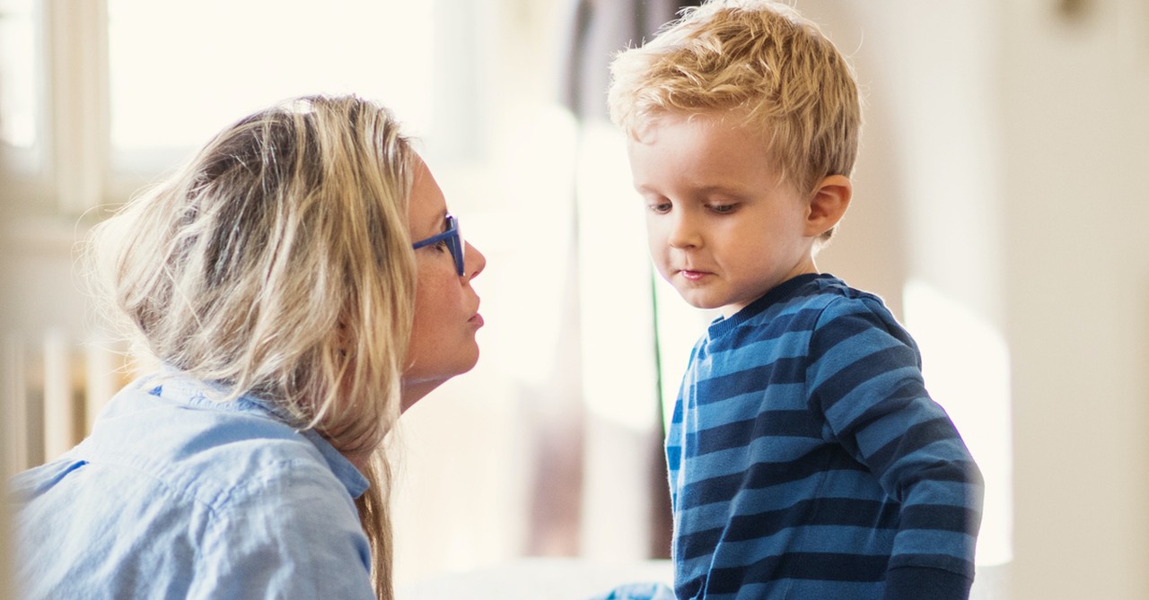 Mom talking to young son