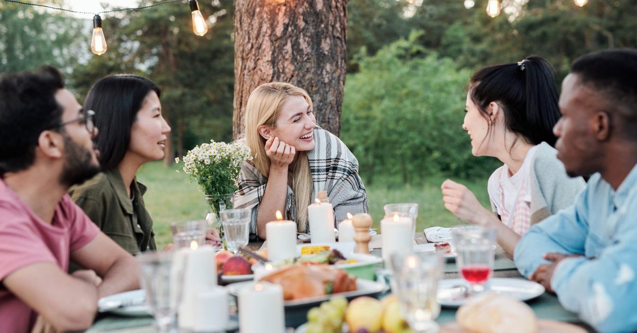 A group of people having dinner