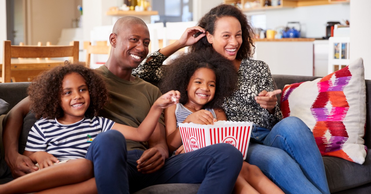 a family watching a movie, top christian movies of 2021