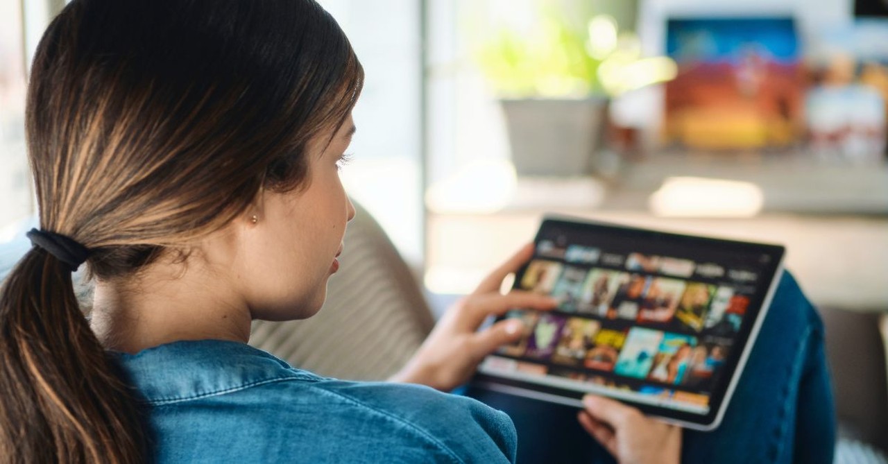 Woman watching her tablet