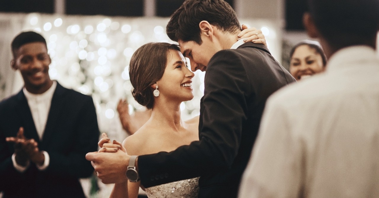 A man and woman dancing on their wedding day