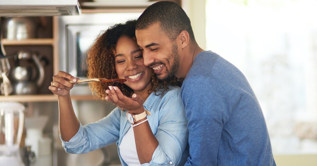 Happy couple in kitchen