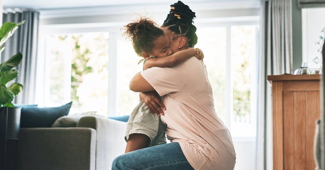 Mom comforting daughter