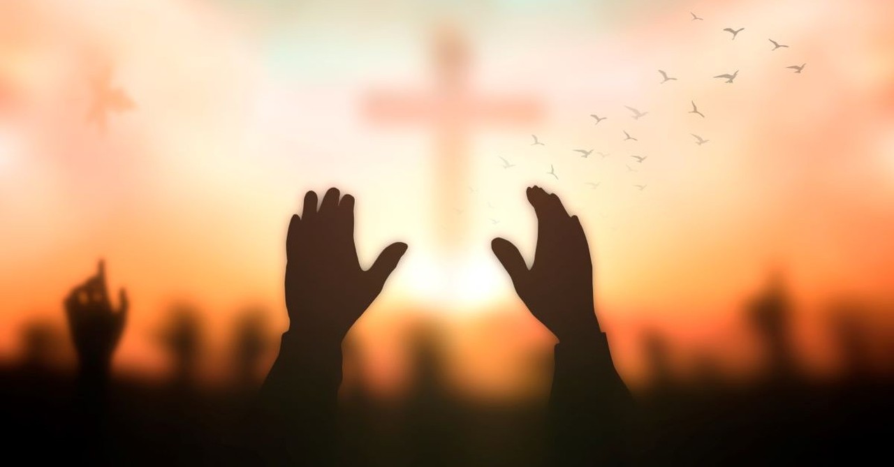 worship hands raised toward cross, thankfulness challenge