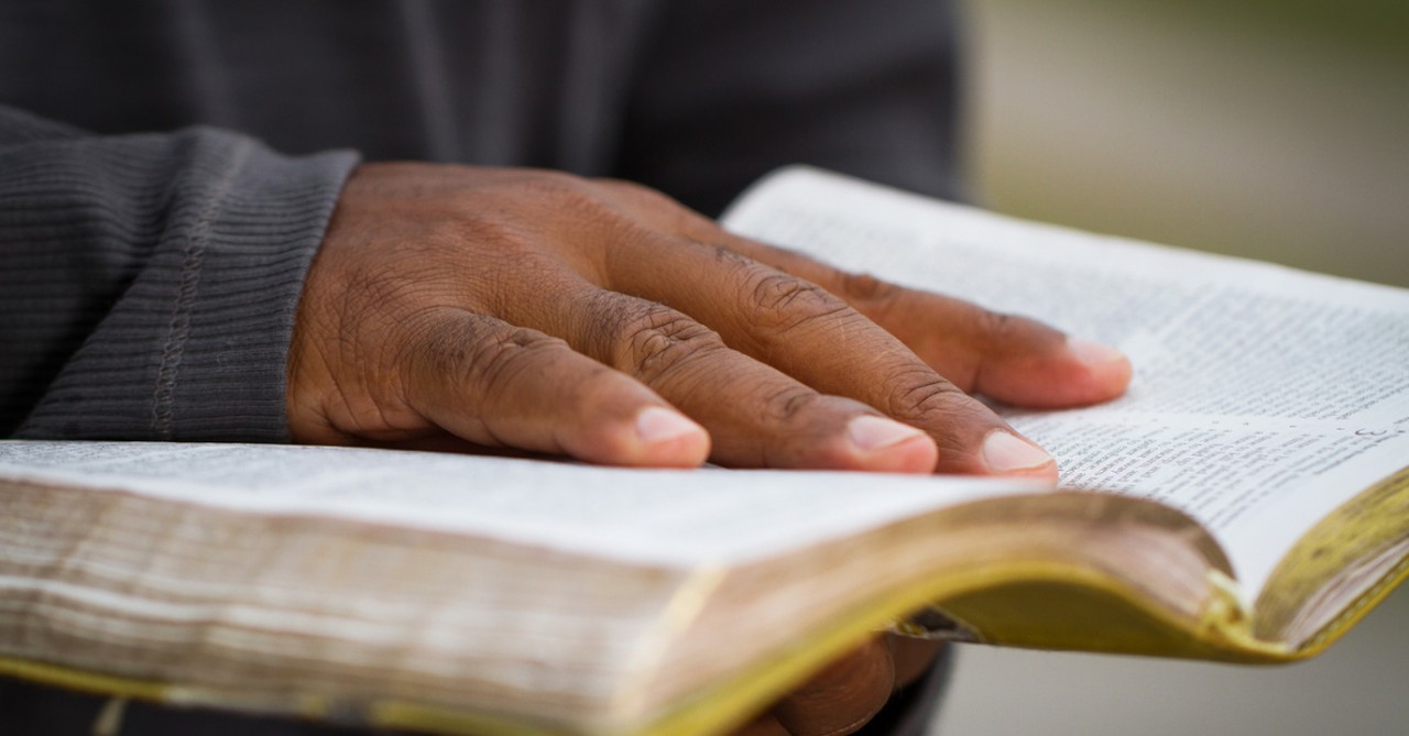 A man holding a Bible, Hillsong Atlanta pastor resigns