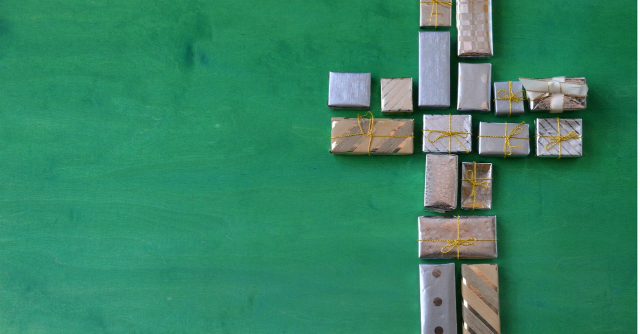 gifts arranged into shape of cross Christmas