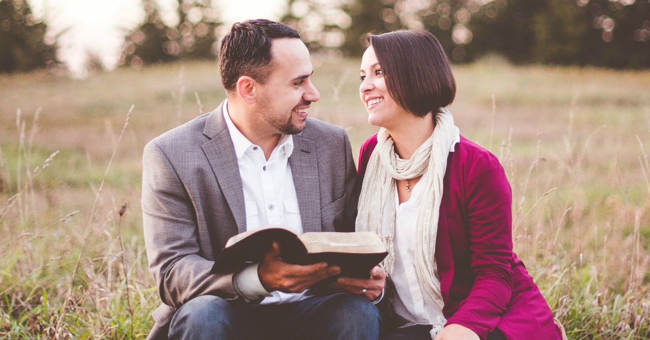 Couple reading the Bible together