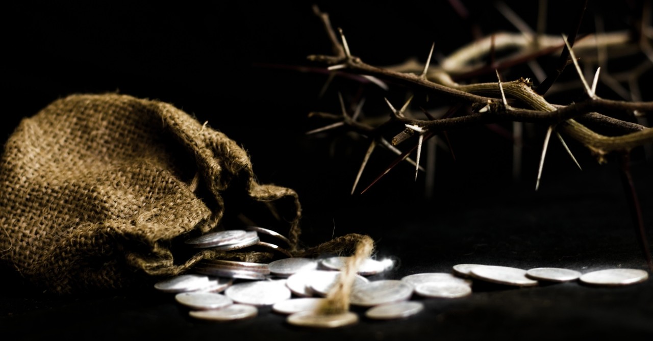 judas' bribe next to crown of thorns, last supper