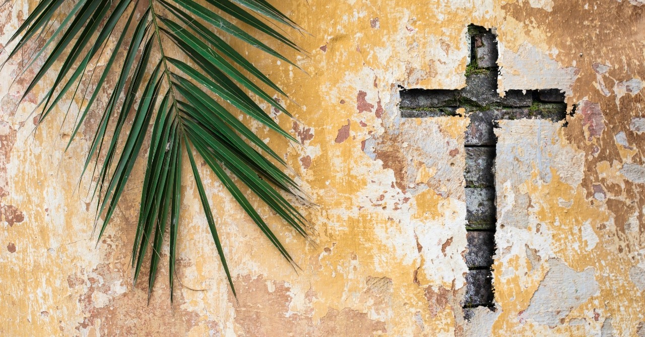 palm frond by a cross, palm sunday reflections