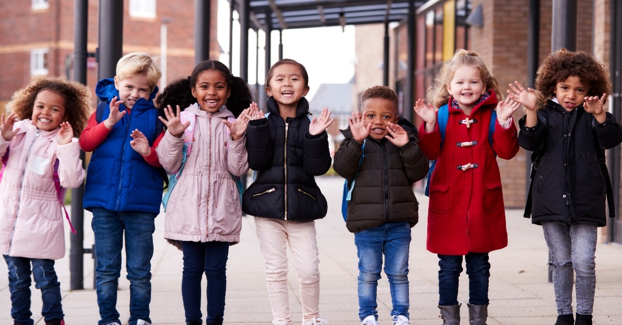 children outside in winter coats