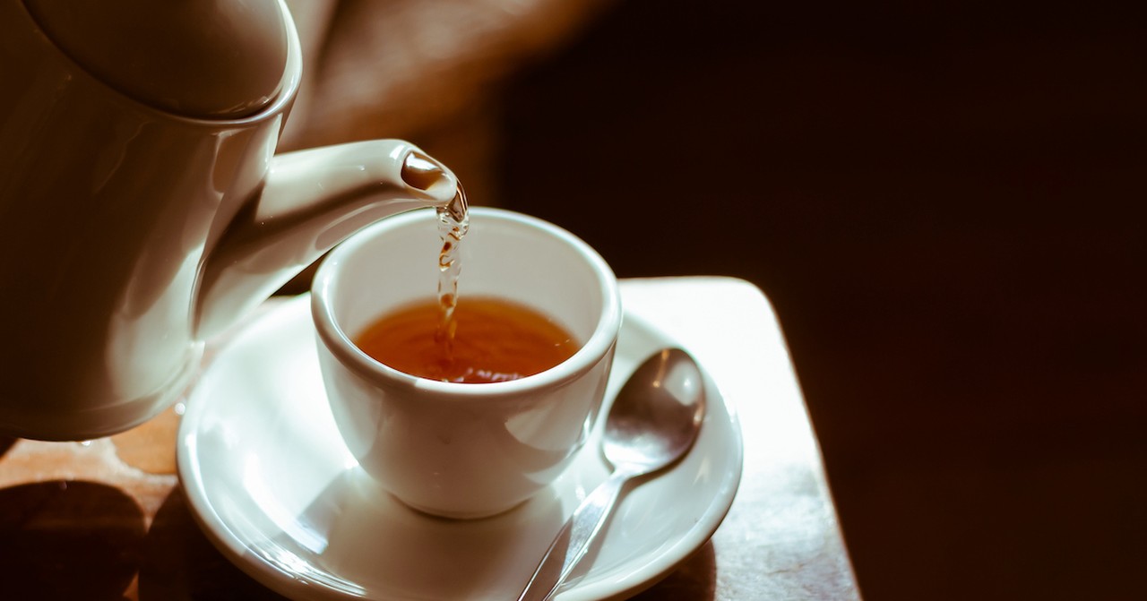 Teapot spilling tea