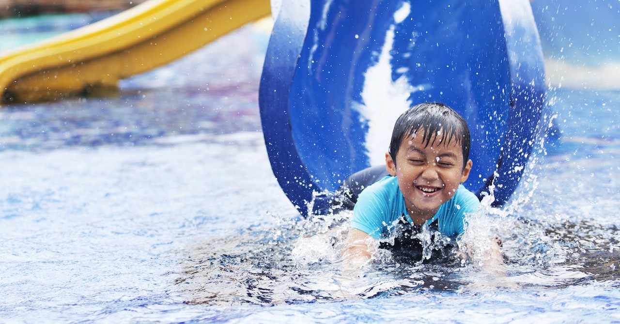 Kid at water park in Summer