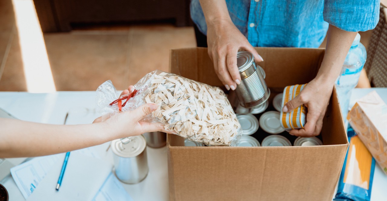 Couple serving food pantry